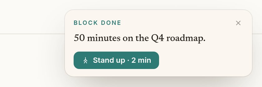 Card after a focus block: Block done, 50 minutes on the Q4 roadmap, with a Stand up · 2 min button.